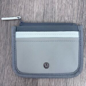 Lululemon gray and white zip card wallet